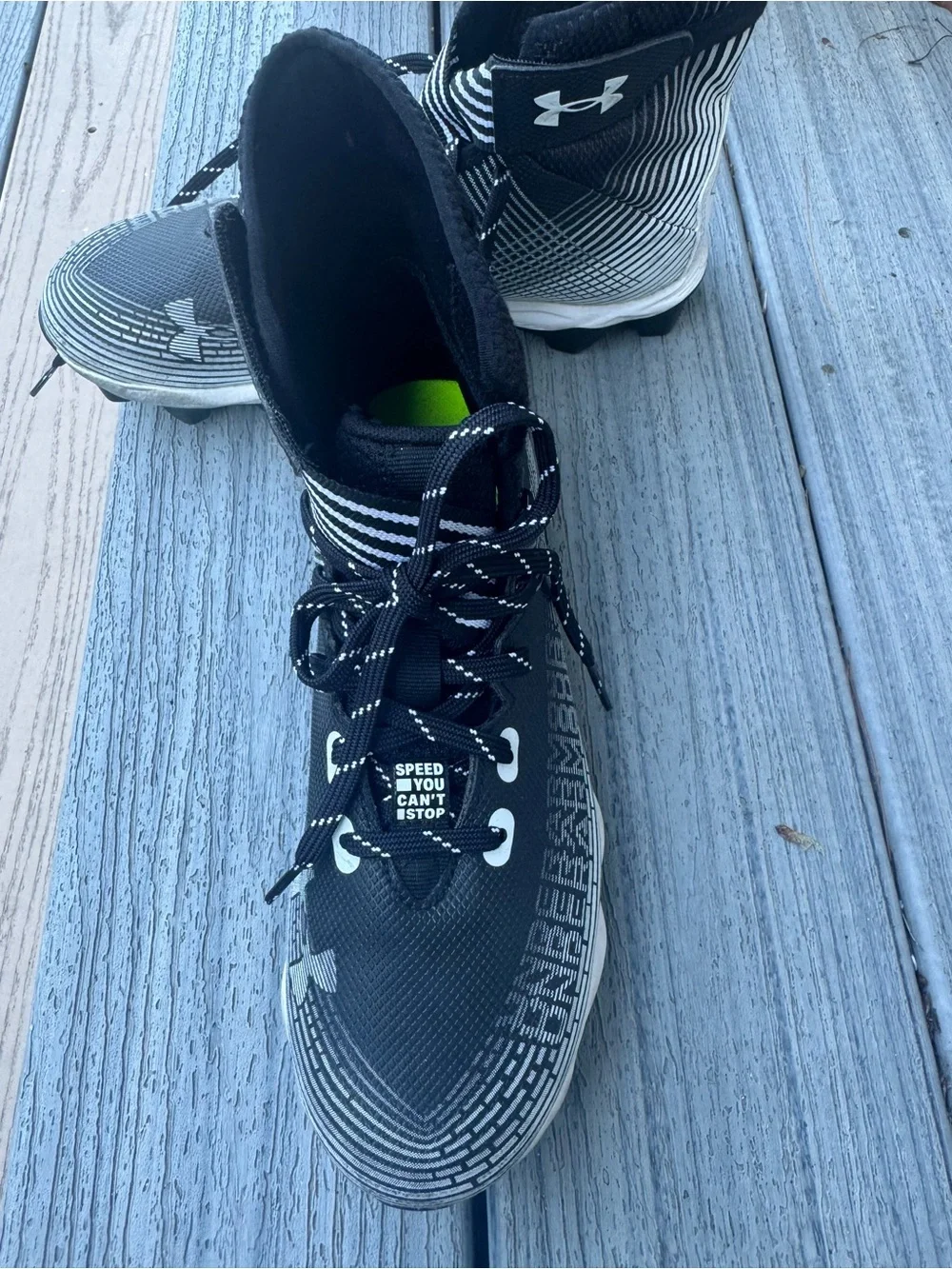 Under Armour Men’s Black and White High-Top Athletic Cleats